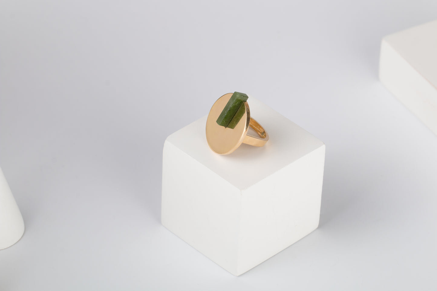 gold Halo ring with green gemstone/Cairo.Egypt