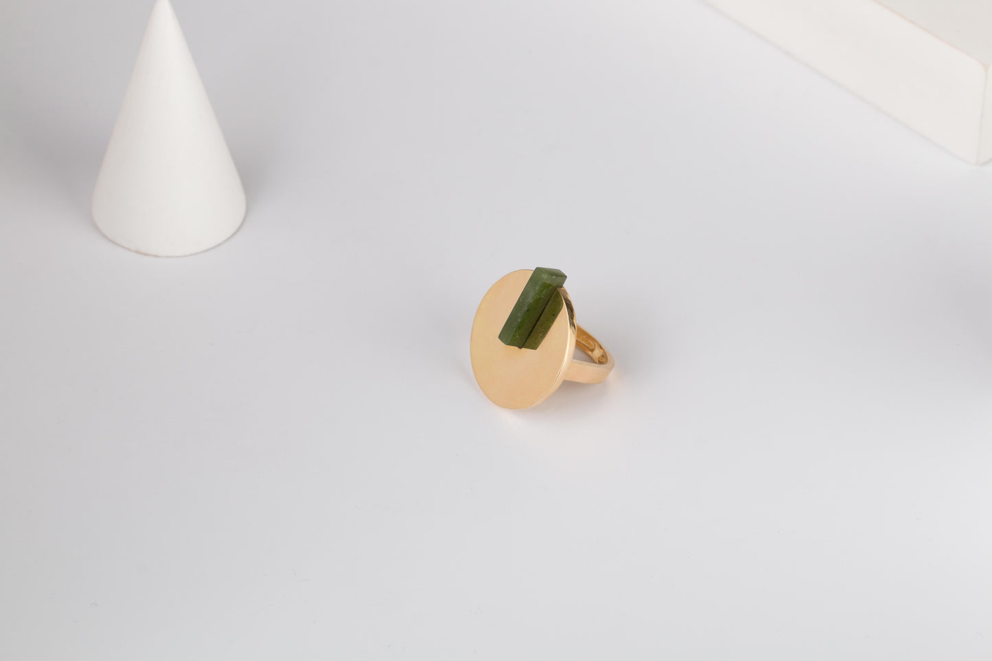 gold Halo ring with green gemstone/Cairo.Egypt