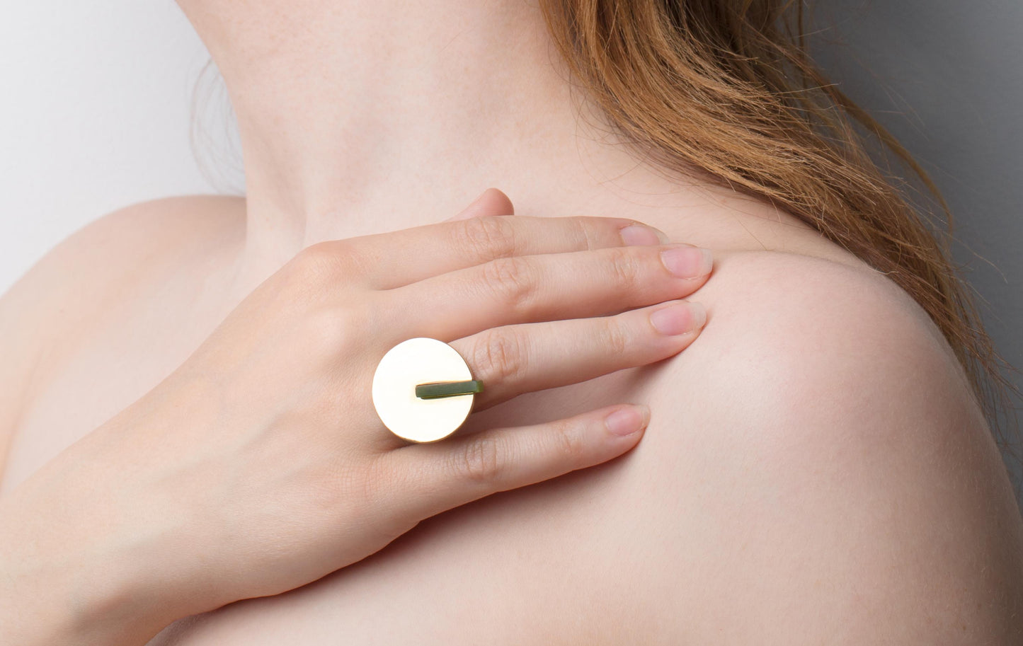 gold Halo ring with green gemstone/Cairo.Egypt